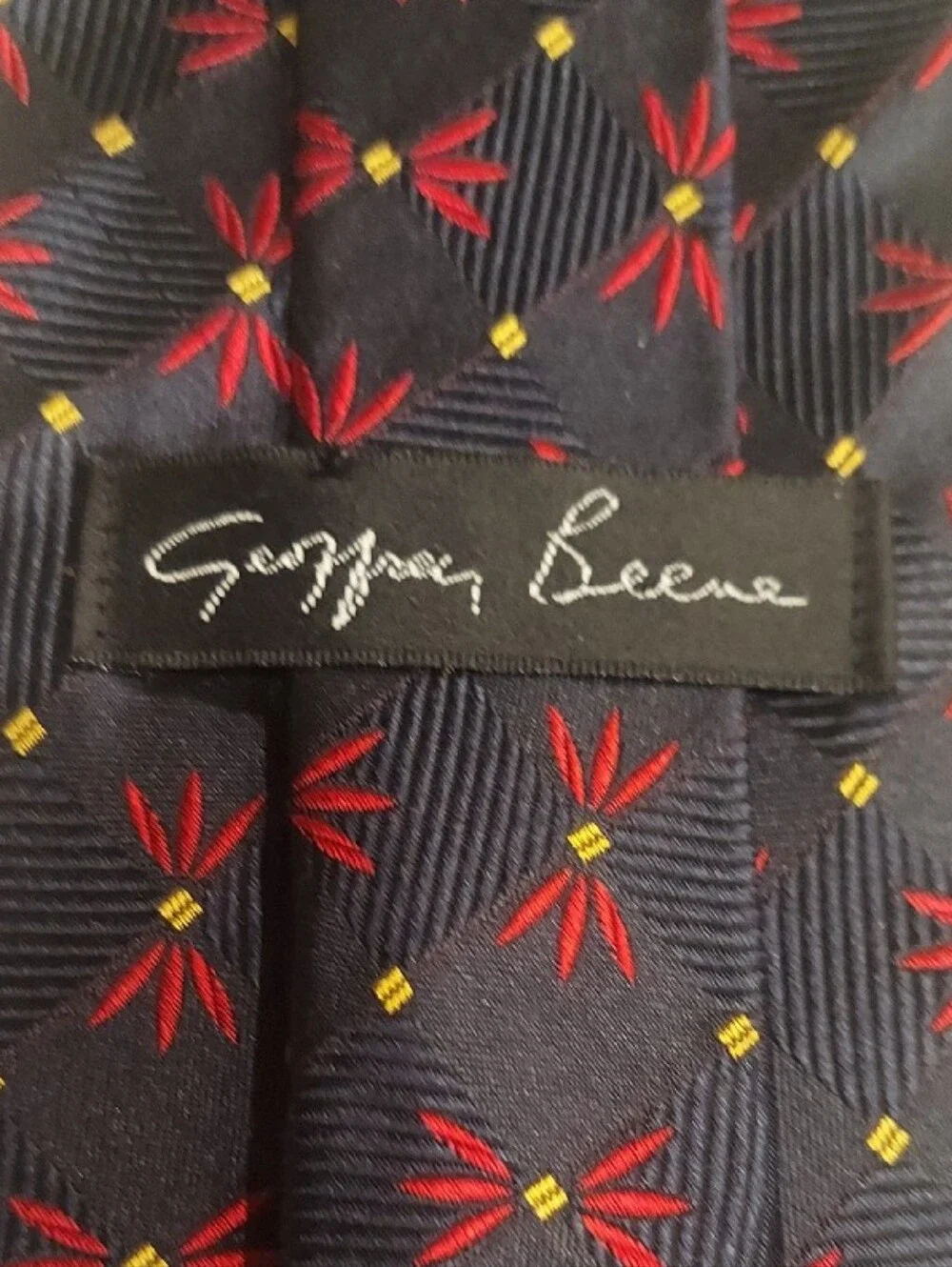 Vintage Geoffrey Beene Silk Navy Tie with Red Floral Pattern and Yellow Accents